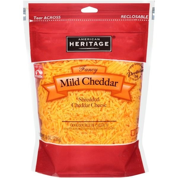 https://www.khastores.com/wp-content/uploads/2023/02/American-Heritage-Fancy-Shredded-Mild-Cheddar-Cheese-226.79g.jpg